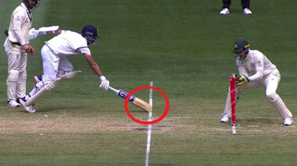 Why do batters tap the cricket bat on the pitch?